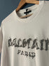 Balmain " Blurred Logo " Print T-Shirt styled in White for Spring&Summer 2023
