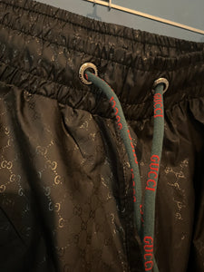 Gcc "G&G ALLOVER PRINT FLY " SwimShorts styled in Black Spring&Summer 2023 Collection