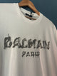 Balmain " Blurred Logo " Print T-Shirt styled in White for Spring&Summer 2023