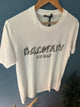 Balmain " Blurred Logo " Print T-Shirt styled in White for Spring&Summer 2023