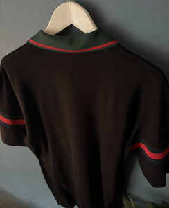 Gucci " Logo " Polo T-Shirt styled in Black for Spring&Summer 2024