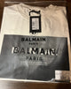 Balmain "HOLOGRAPHIC Logo" T-Shirt styled in White Spring/Summer 2024