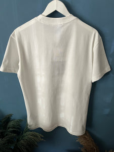Balmain "Logo Printed" T-Shirt styled in White for Spring/Summer 2024