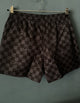 LV "Logogram" SwimShorts styled in Black Spring&Summer 2024 Collection