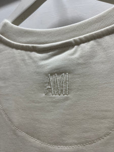 Ami " Logo PLUGGED" Tee styled in White for Spring&Summer 2025