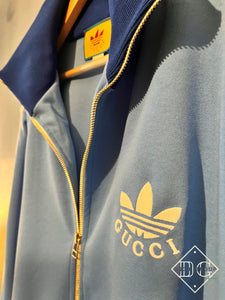 Gcc x Adidas "Logo-Embroidered" Side-Striped Jacket styled in Red for Fall&Winter 2023