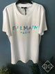 Balmain "HOLOGRAPHIC Logo" T-Shirt styled in White Spring/Summer 2021